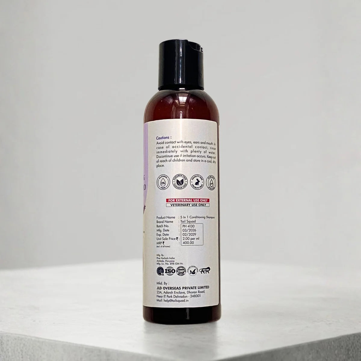 Back label of 5-in-1 dog shampoo showing cautions and usage instructions.