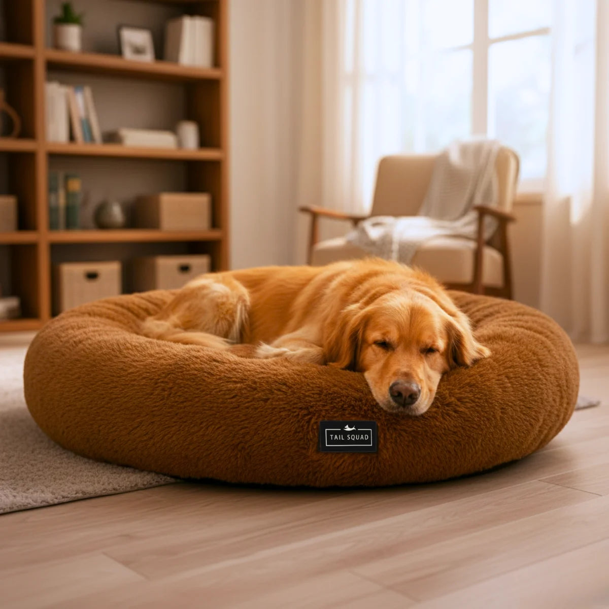 Dog sleeping on Tail Squad Round Bed for Dogs Coffee featuring calming plush faux fur and cozy orthopedic pet support
