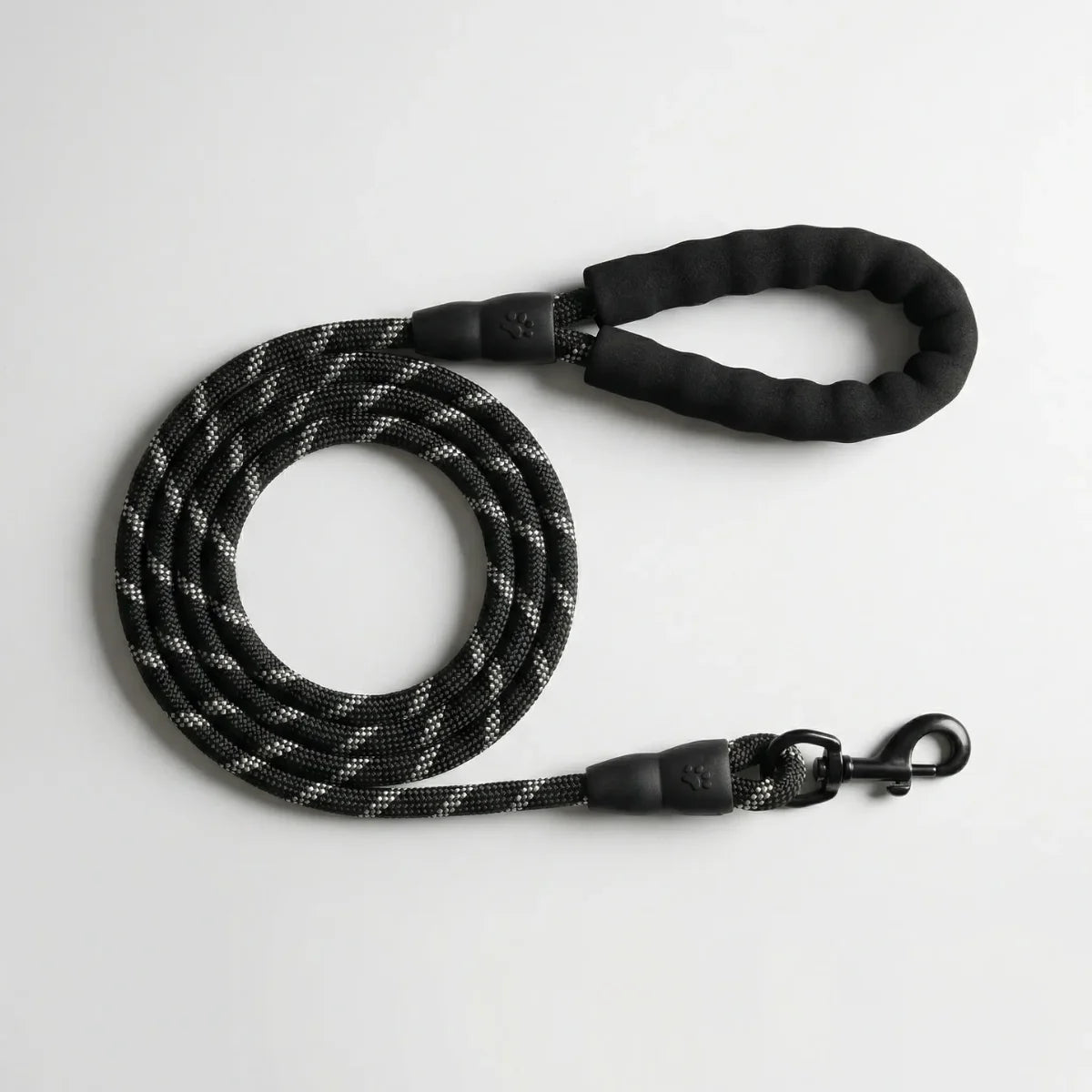 Black reflective rope dog leash with durable handle and secure metal clasp for daily walks.