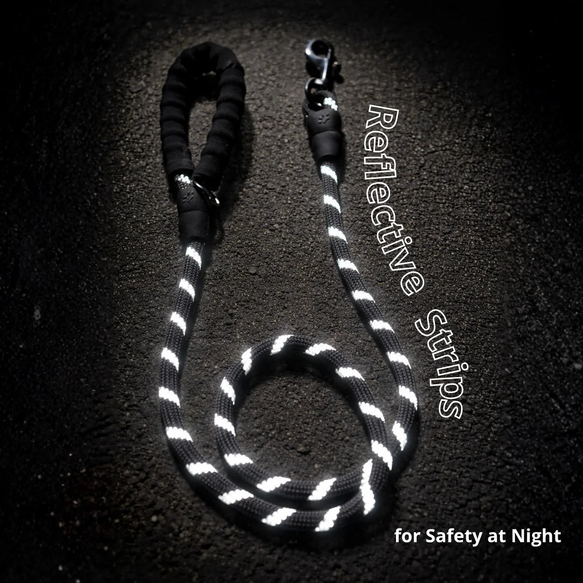Reflective stitching on a black dog leash for improved visibility in low light.