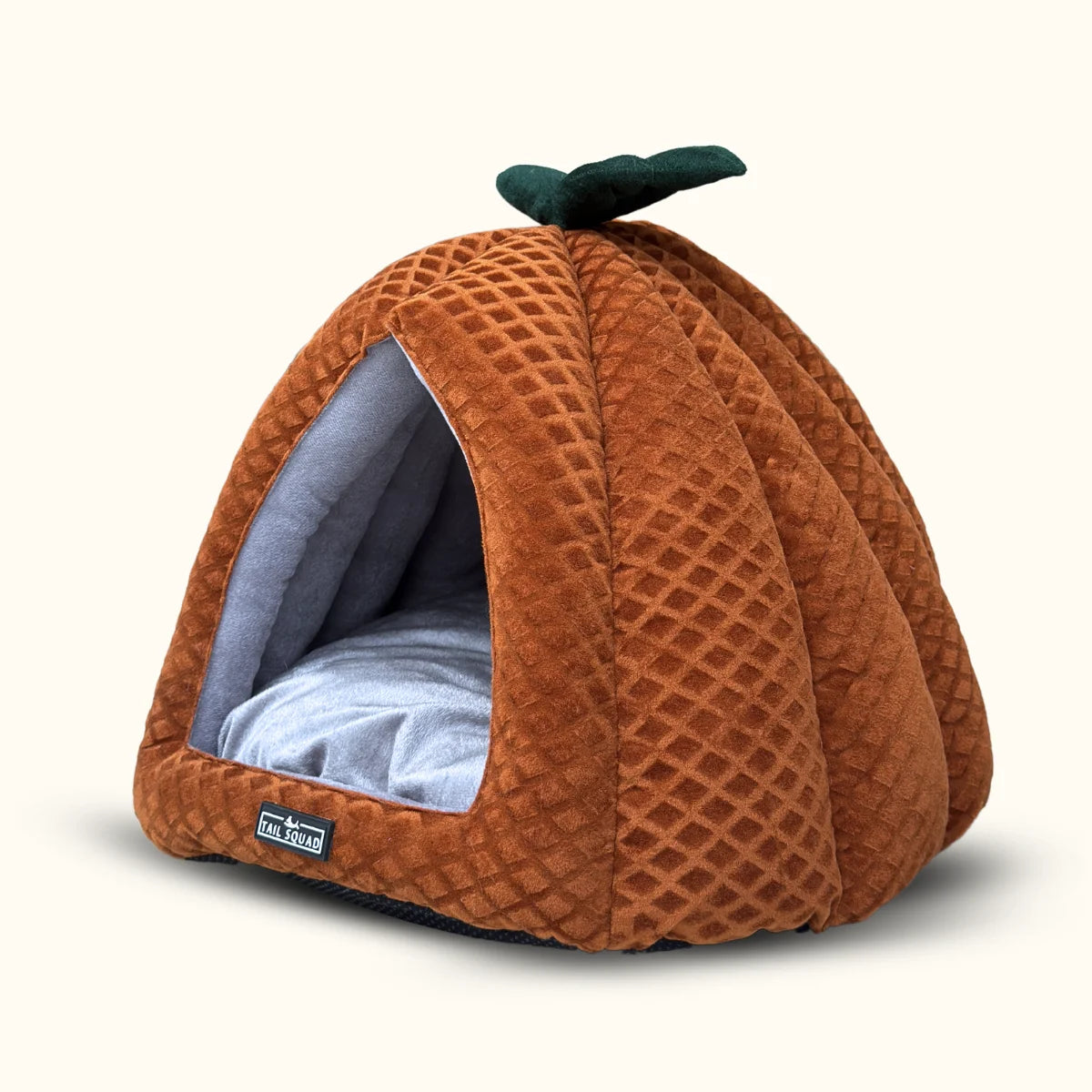 Tail Squad Pumpkin Cat Hut Rust side close-up showing soft fabric stitching and warm cozy enclosed pet shelter design