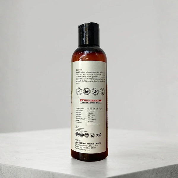 Back label of anti tick and flea dog shampoo showing cautions and usage instructions.
